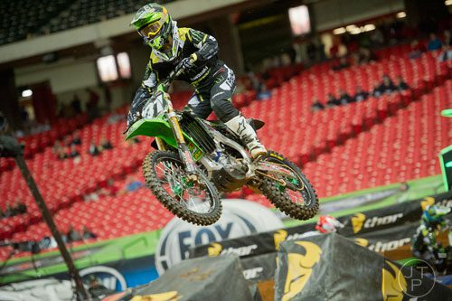 Martin Davalos (31) catches some air as he competes in a qualifying round of the Monster Energy AMA Supercross FMI World Championship at the Georgia Dome in Atlanta on Saturday, February 22, 2014.