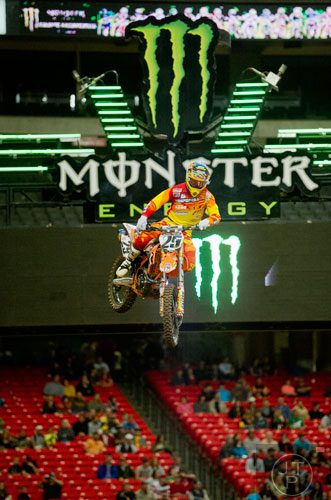 Andrew Short (29) catches some air as he competes in a qualifying round of the Monster Energy AMA Supercross FMI World Championship at the Georgia Dome in Atlanta on Saturday, February 22, 2014. 