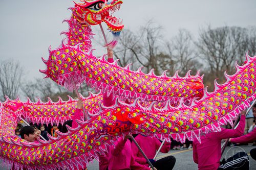 A paper dragon entertains the crowd during the Atlanta Chinese Lunar New Year Festival in Chamblee on Saturday, February 1, 2014. 
