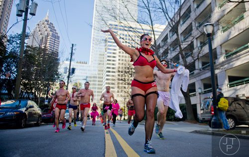 Melissa Katcoff (center) heads toward the finish line during the Cupid Undies Run in Midtown on Saturday, February 15, 2014. 