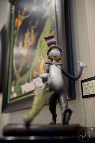 A Cat in the Hat figurine sits on display for the "Hats Off to Dr. Seuss" national traveling exhibit at the Ann Jackson Gallery in Roswell on Sunday, February 16, 2014. 