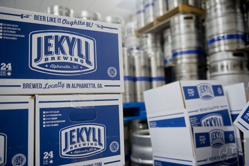 Boxes of beer and kegs sit in the storage room at Jekyll Brewing in Alpharetta on Tuesday, February 18, 2014.