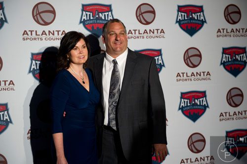Norcross High School's head football coach Keith Maloof walks the red carpet with his wife Lisa during the 9th annual Atlanta Sports Awards at the Fox Theatre on Wednesday, March 5, 2014. 