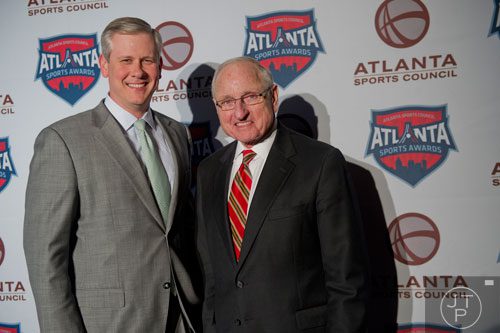 Former University of Georgia head coach Vince Dooley (right) walks the red carpet with John Stephenson during the 9th annual Atlanta Sports Awards at the Fox Theatre on Wednesday, March 5, 2014. 