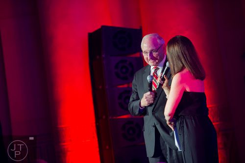 Vince Dooley talks with Sandra Golden during the 9th annual Atlanta Sports Awards at the Fox Theatre on Wednesday, March 5, 2014. 