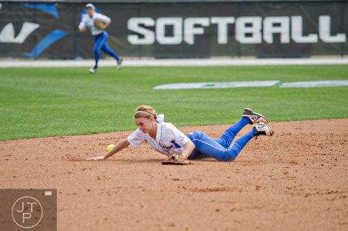Georgia State's Taylor Anderson tries to stop a ball from going into the outfield during their game against UL Lafayette on Saturday, March 22, 2014.