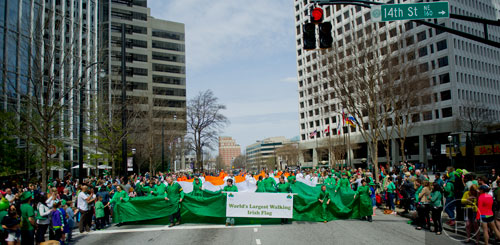 The World's Largest Walking Irish Flag makes its way down Peachtree St. during the Atlanta St. Patrick's Day Parade on Saturday, March 15, 2014. 