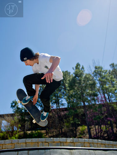 Ryan Wood catches some air as he rides his board at the Historic Fourth Ward Skatepark in Atlanta on Wednesday, March 26, 2014. 