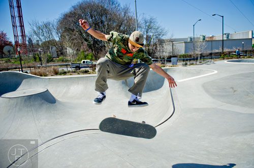 Sam Buxton rides his board at the Historic Fourth Ward Skatepark in Atlanta on Wednesday, March 26, 2014.