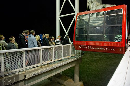 A line of people wait for the skylift to take them to the top of Stone Mountain before the start of the 70th annual Easter Sunrise Service on Sunday, April 20, 2014. 