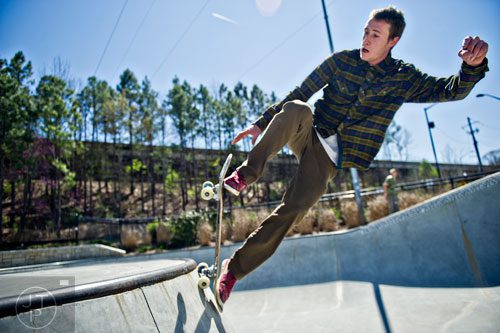 Pro skater Grant Taylor rides his board at the Historic Fourth Ward Skatepark in Atlanta on Wednesday, March 26, 2014. 
