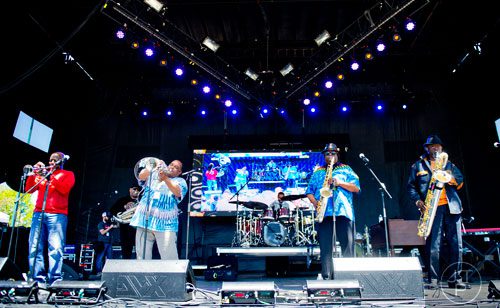 Members of  the Dirty Dozen Brass Band, Gregory Davis (left), Efrem Towns, Kevin Harris and  perform on stage during the Sweetwater 420 Festival at Centennial Olympic Park on Sunday, April 20, 2014. 