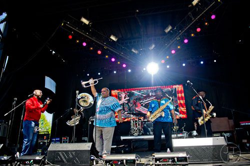 Members of  the Dirty Dozen Brass Band, Gregory Davis (left), Efrem Towns, Kevin Harris and Roger Lewis perform on stage during the Sweetwater 420 Festival at Centennial Olympic Park on Sunday, April 20, 2014. 