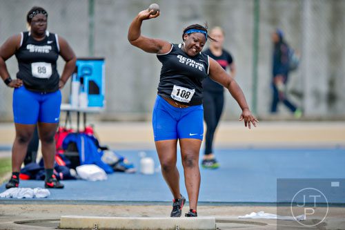 Georgia State's LaPorscha Wells heaves the shot put during the Yellow Jacket Invitational track meet on Saturday, March 29, 2014.