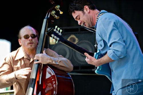 Members of G. Love & Special Sauce, Garrett Dutton (right) and Jim Prescott, perform on stage during the Sweetwater 420 Festival at Centennial Olympic Park on Sunday, April 20, 2014.