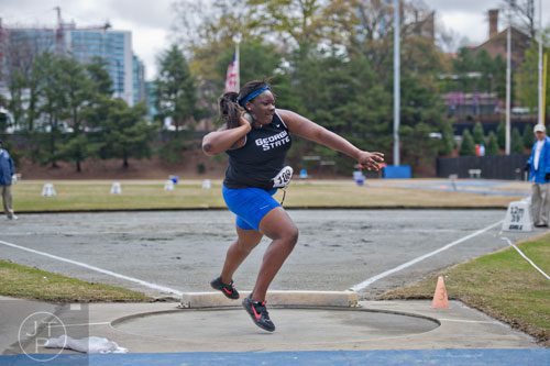 Georgia State's LaPorscha Wells heaves the shot put during the Yellow Jacket Invitational track meet on Saturday, March 29, 2014.