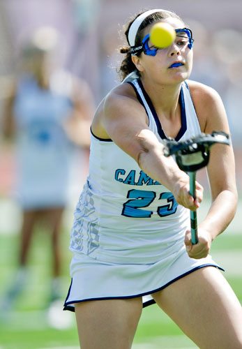 Cambridge's Virginia Gibson (23) takes a shot on goal during their game against Lake Norman (NC) on Friday, April 25, 2014.