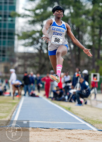 Georgia State's Gabby Brooks flies through the air in the Long Jump during the Yellow Jacket Invitational track meet on Saturday, March 29, 2014.