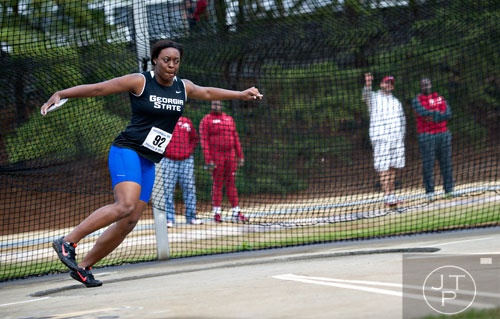 Georgia State's Kelsey Gray spins as she competes in the Discuss during the Yellow Jacket Invitational track meet on Saturday, March 29, 2014.