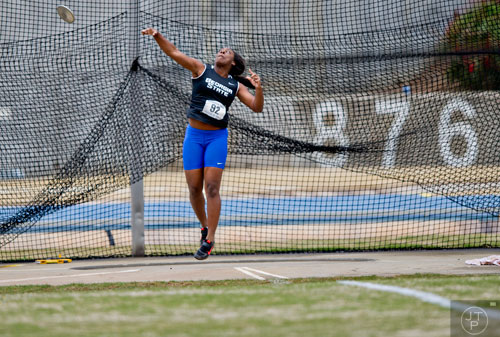 Georgia State's Kelsey Gray lets loose of her discus during the Yellow Jacket Invitational track meet on Saturday, March 29, 2014.