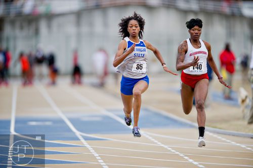 Georgia State's Wande Brewer moves down the track in the 100 Meter Dash during the Yellow Jacket Invitational track meet on Saturday, March 29, 2014.