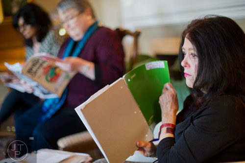Author Rosemary Daniell (right) leads a Zona Rosa writers' workshop at her sister's home in Buckhead on Thursday, March 20, 2014. 