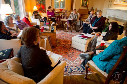 Author Rosemary Daniell (right) leads a Zona Rosa writers' workshop at her sister's home in Buckhead on Thursday, March 20, 2014. 