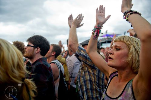 Laci Meyer claps along to the music as Dropkick Murphys performs on stage during the Shaky Knees Music Festival at Atlantic Station in Atlanta on Friday, May 9, 2014. 