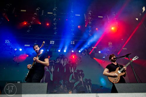 Jimmy Smith (left) and Yannis Philippakis from the band Foals perform on stage during the Shaky Knees Music Festival at Atlantic Station in Atlanta on Friday, May 9, 2014. 