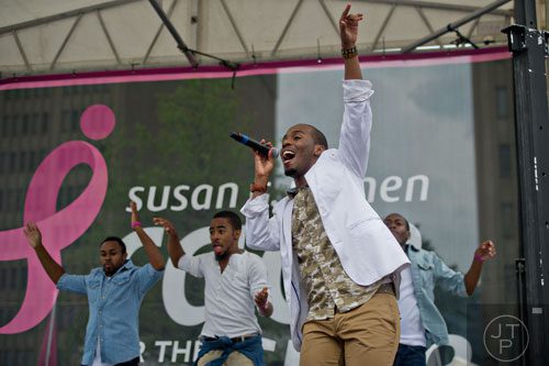 Vince Ashton performs on stage after the Susan G. Komen Race for the Cure at Lenox Square Mall on Saturday, May 10, 2014. 