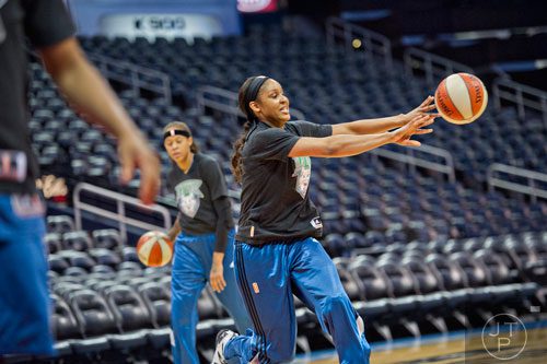 Minnesota Lynx forward Maya Moore (center) passes the ball during warmups before taking on the Atlanta Dream at Philips Arena on Friday, June 13, 2014.  