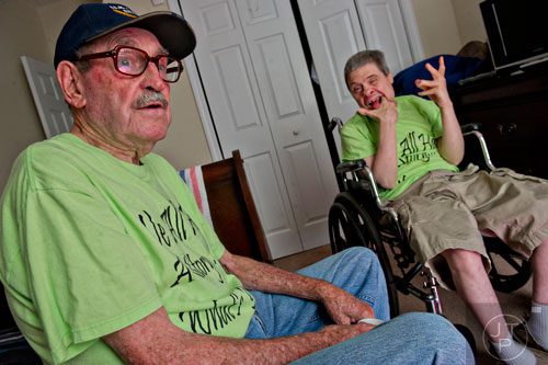 Alvin McGarity (left) visits with his son Keith at the Southern Community Living Group home in McDonough on Sunday, June 15, 2014. 