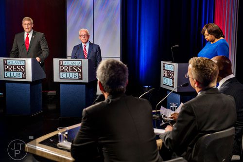 11th Congressional district candidates Barry Loudermilk (left) and Bob Barr answer questions from panelists during the Atlanta Press Club's Loudermilk-Young Debate Series at the Georgia Public Broadcasting studios in Atlanta on Sunday, July, 13, 2014.    