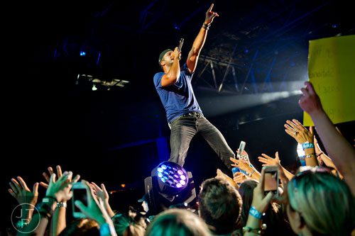 Luke Bryan performs on stage during his That's My Kind of Night Tour at Aaron's Amphitheatre at Lakewood in Atlanta on Friday, July 25, 2014.  