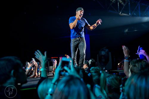 Luke Bryan performs on stage during his That's My Kind of Night Tour at Aaron's Amphitheatre at Lakewood in Atlanta on Friday, July 25, 2014. 