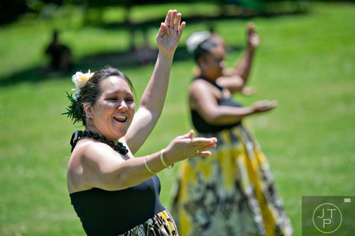 Nikki Baugh dances as she performs during the Nezian Festival at Grant Park in Atlanta on Saturday, July 5, 2014.