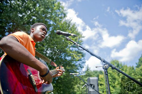 Keyvious Avery performs on one of three stages during the Grant Park Summer Shade Festival in Atlanta on Saturday, August 23, 2014. 