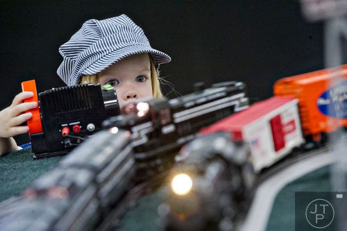Eliot Mohalski operates a model train during the 47th Atlanta Model Train and Railroadiana Show and Sale at the North Atlanta Trade Center in Norcross on Saturday, August 9, 2014. 