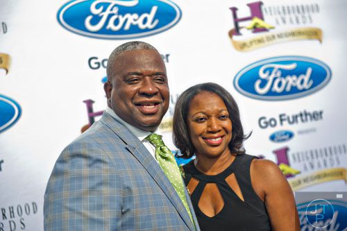 Nominee for Best High School Coach James Hartry poses for photos on the blue carpet before the 2014 Ford Neighborhood Awards at Philips Arena in Atlanta on Saturday, August 9, 2014.