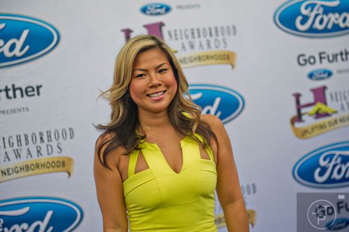 Nominee for Best Nail Salon, founder of Polish'd Sheueli Chun poses for photos on the blue carpet before the 2014 Ford Neighborhood Awards at Philips Arena in Atlanta on Saturday, August 9, 2014. 