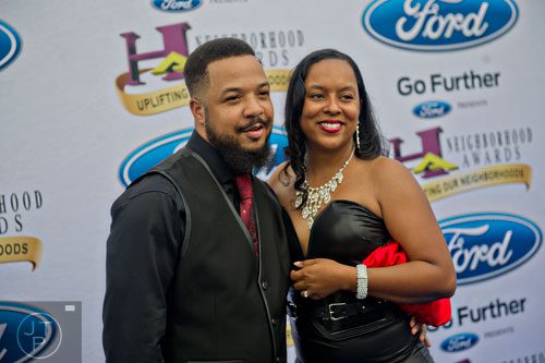 Members of the Nappy Root Barber Shop in Columbus walk on the blue carpet before the 2014 Ford Neighborhood Awards at Philips Arena in Atlanta on Saturday, August 9, 2014. 