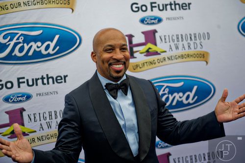 Thomas Miles, better known as Nephew Tommy, poses for photos on the blue carpet before the 2014 Ford Neighborhood Awards at Philips Arena in Atlanta on Saturday, August 9, 2014. 