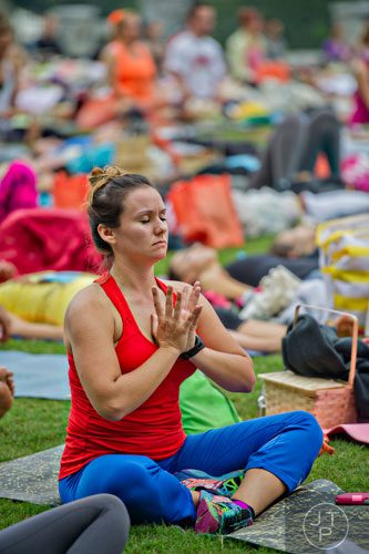 Melissa Ireland practices meditation during Wanderlust 108 at Piedmont Park in Atlanta on Sunday, September 28, 2014. 