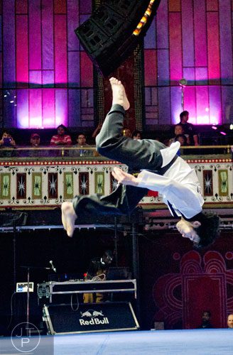 Mincheol Shin flies through the air as he competes in the Red Bull Throwdown Atlanta at the Tabernacle in Atlanta on Sunday, September 28, 2014. 