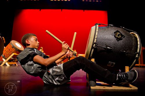 Kyle Watkins plays a Taiko drum during the 2014 JapanFest at the Gwinnett Center in Duluth on Saturday, September 20, 2014.