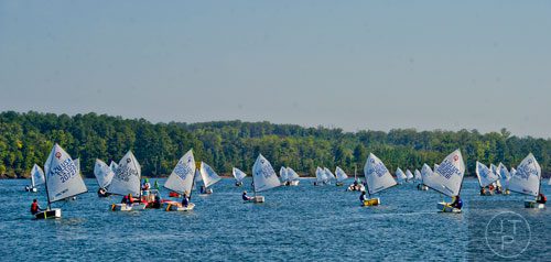 Sailors make their way to the starting line for the start of the 2014 USODA Southeast Championship at Lake Allatoona in Acworth on Sunday, September 21, 2014. 