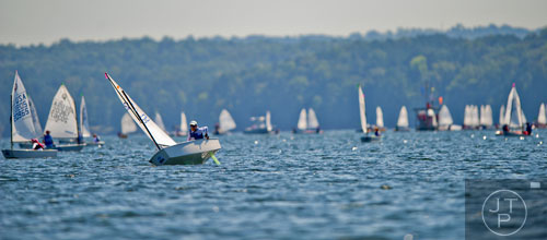 Boyd Bragg (left) sails his dinghy during the 2014 USODA Southeast Championship at Lake Allatoona in Acworth on Sunday, September 21, 2014. 