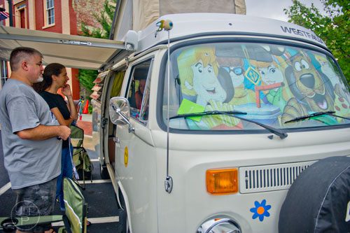 Jack Griffin (left) and his wife Michele check out a 1978 Volkswagen westfalia during the 11th Annual Flowery Branch Car Show and Chili Cook Off on Saturday, September 13, 2014. 