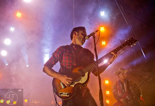 Jared Swilley (left) and Cole Alexander from the band The Black Lips perform on stage at The Goat Farm in Atlanta on Saturday, October 4, 2014.