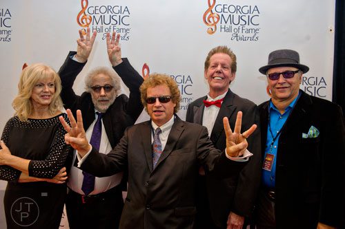 Jimmy Hall (center) and other members from the band Wet Willie walk the red carpet for the 2014 Georgia Music Hall of Fame Awards at the Georgia World Congress Center in Atlanta on Saturday, October 11, 2014.   